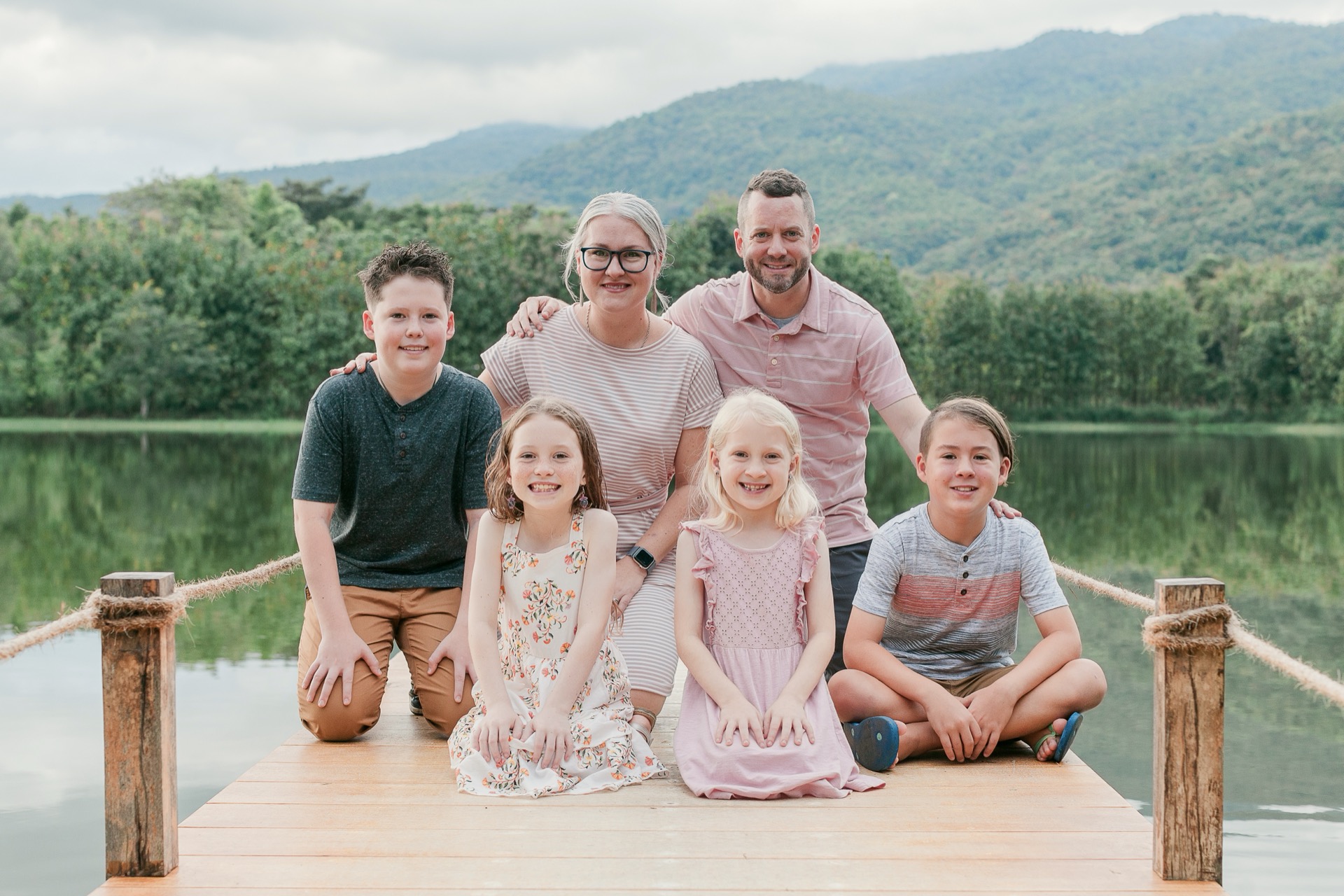 The Derington family together beside a lake in Chiang Mai